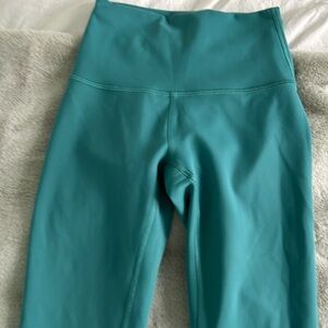 Beautiful Teal Leggings. Barely worn by my daughter. No pulling. Like new!